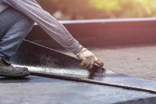 Professional Basement Waterproofing technician working in Bon Air, VA